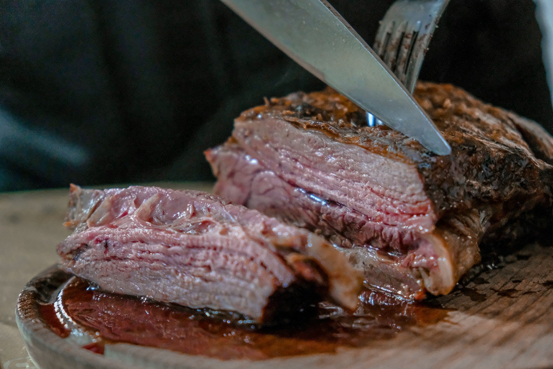 Premium steaks and chops on the grill — the same cuts available in the shop.
